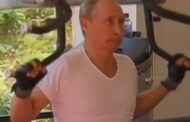 صور الرئيس بوتين يرفع الأثقال للتباهي