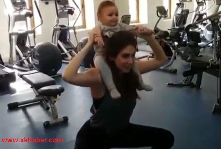 بالفيديو.. الاعلامية ديما صادق تقوم بتمارين رياضية مع طفلتها