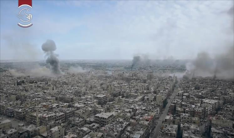 مئة غارة على مدينة دوما السورية بيوم واحد
