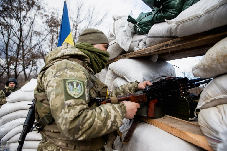 a soldier of Ukraine watvhing Russian invasion